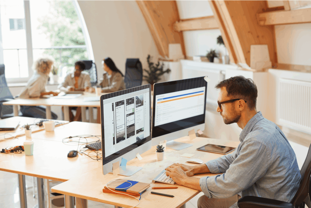 man using internal comms software on computer