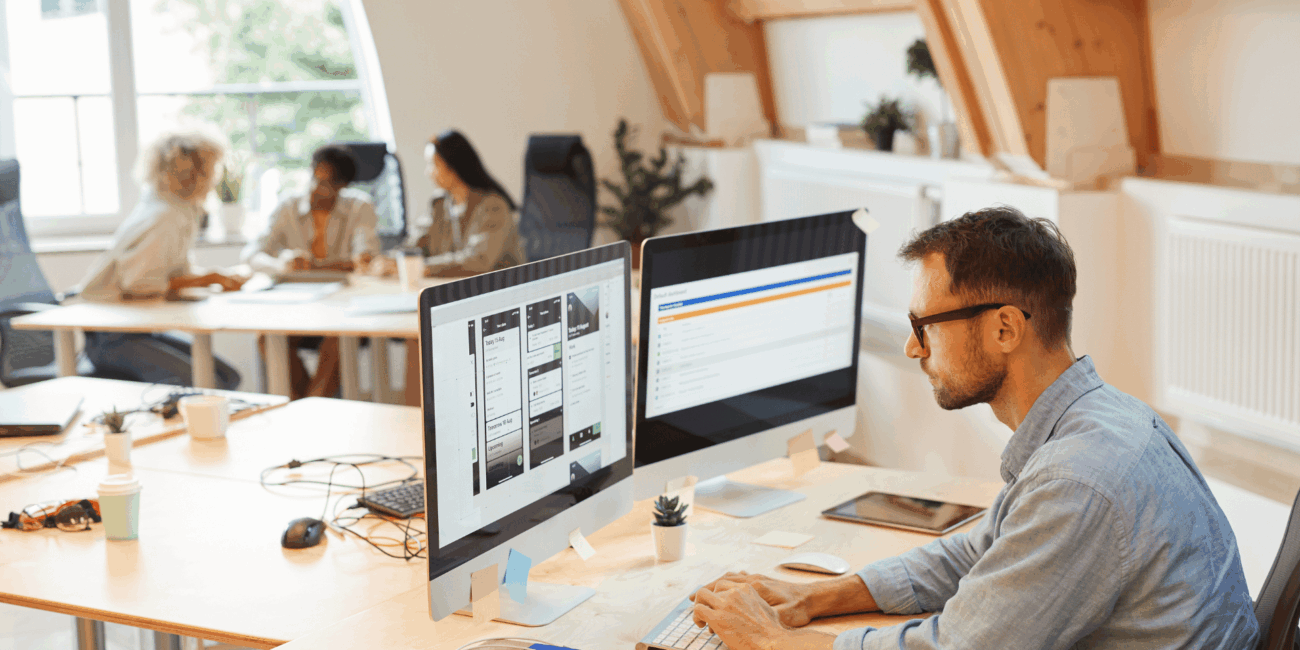 man using internal comms software on computer